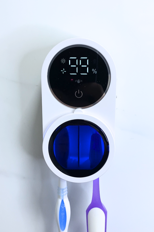 PureVee UV toothbrush sanitizer in use, effectively sterilizing toothbrushes.